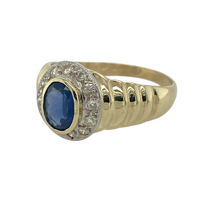 Bring timeless colour and elegant contrast to your jewellery collection with this pre-owned 9ct yellow and white gold diamond & sapphire set ring, offering classic design with refined detail.

Design: The ring features a rich oval sapphire at the centre, complemented by diamond accents that add sparkle and enhance the overall balance of the design.