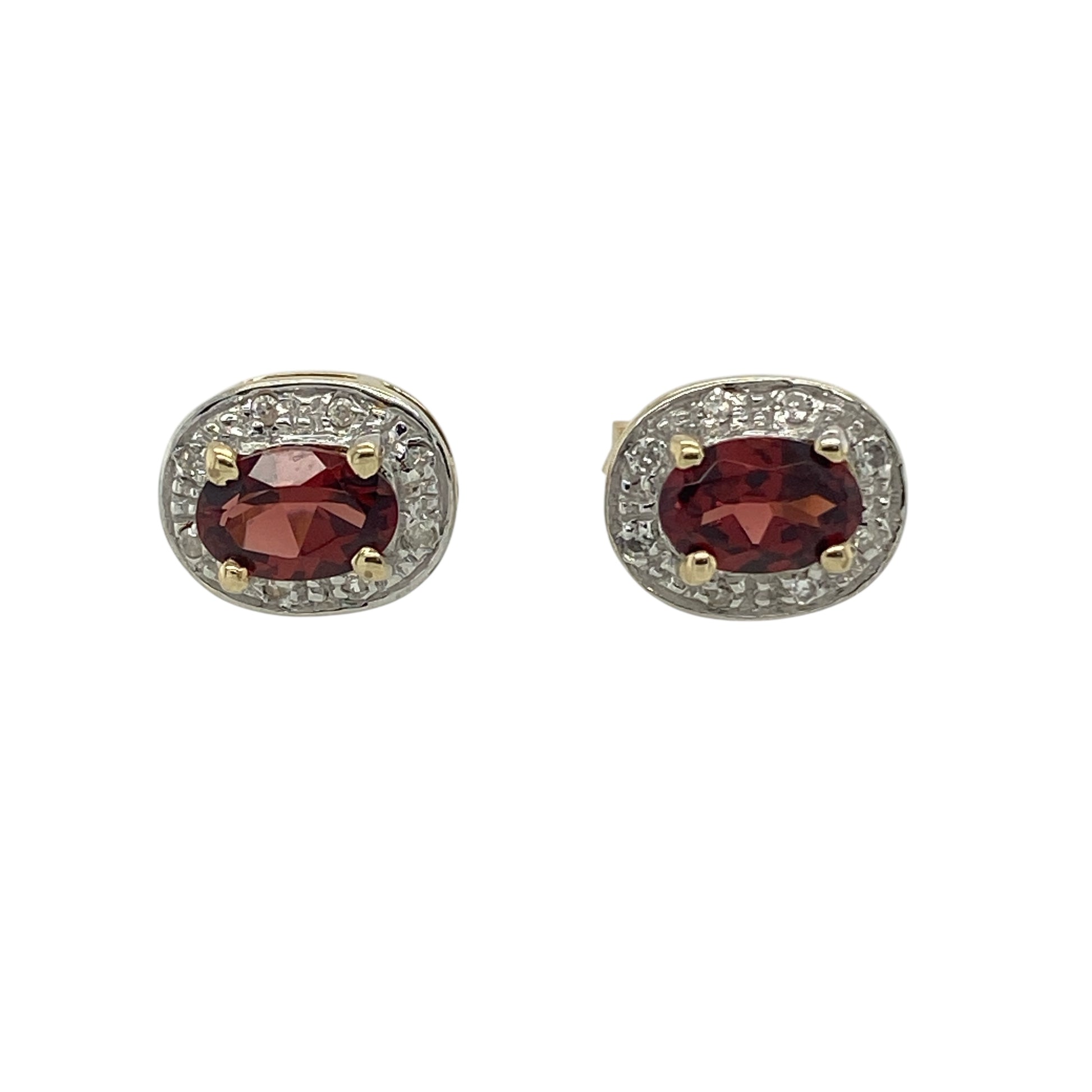 Bring rich colour and elegant sparkle to your jewellery collection with these pre-owned 9ct yellow and white gold diamond & garnet set halo stud earrings, offering classic design with refined contrast.

Design: The earrings feature oval garnet centre stones, each surrounded by a halo of sparkling diamonds, creating a timeless and balanced stud style.
Material: Made from 9-carat yellow and white gold, the two-tone finish enhances the brilliance of the diamonds while beautifully framing the deep red garnets.
