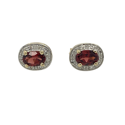 Bring rich colour and elegant sparkle to your jewellery collection with these pre-owned 9ct yellow and white gold diamond & garnet set halo stud earrings, offering classic design with refined contrast.

Design: The earrings feature oval garnet centre stones, each surrounded by a halo of sparkling diamonds, creating a timeless and balanced stud style.
Material: Made from 9-carat yellow and white gold, the two-tone finish enhances the brilliance of the diamonds while beautifully framing the deep red garnets.
