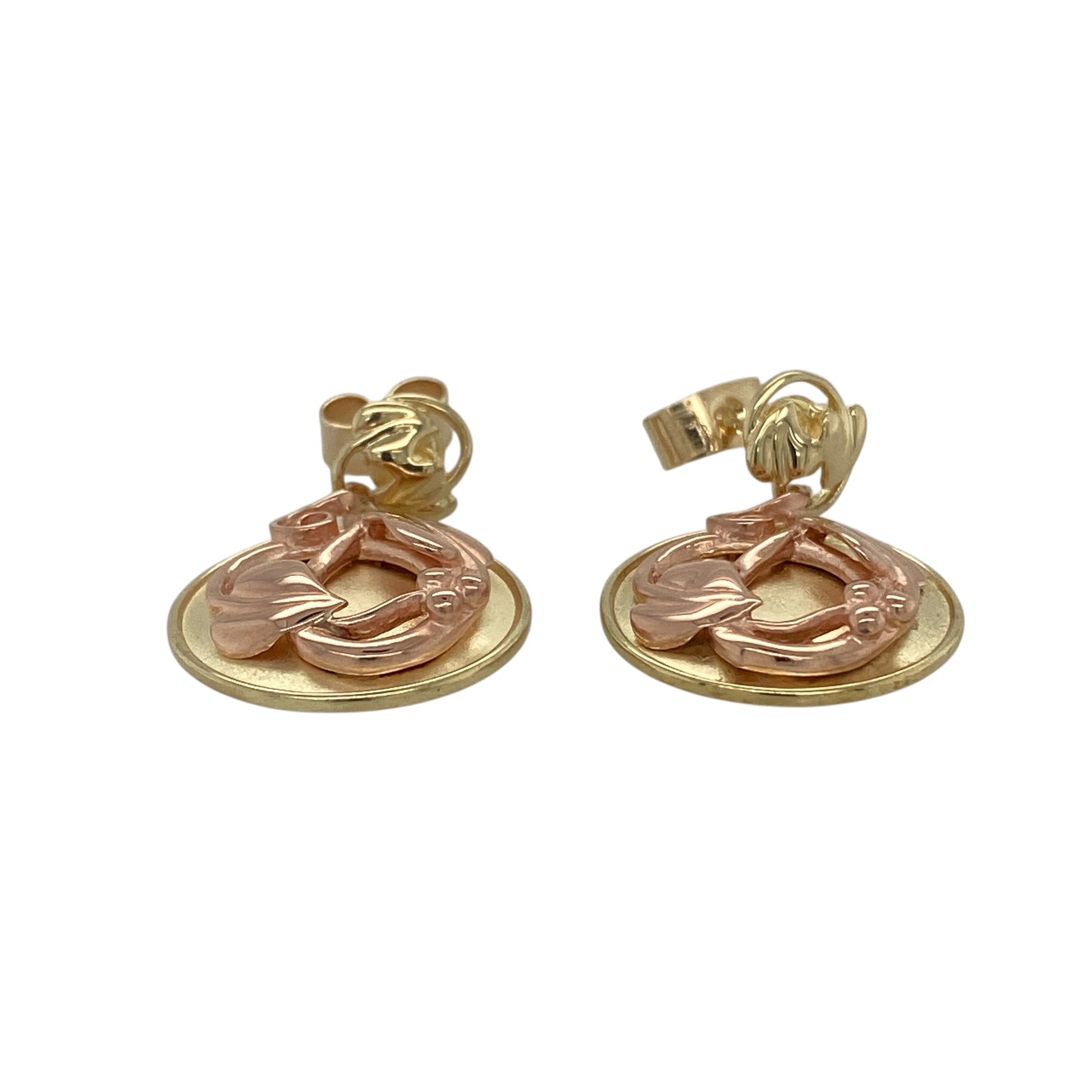 Bring meaningful symbolism and elegant Welsh design to your jewellery collection with these pre-owned 9ct yellow and rose gold Clogau Tree of Life round drop stud earrings, offering timeless style with a refined presence.

Design: The earrings feature round drop discs displaying the iconic Tree of Life motif, symbolising growth, strength, and harmony, suspended from classic stud fittings for gentle movement.