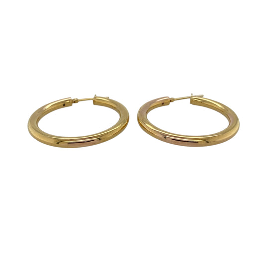 Bring timeless simplicity and classic elegance to your jewellery collection with these pre-owned 18ct yellow gold plain hoop creole earrings, a versatile staple for any style.

Design: The earrings feature a clean, plain hoop creole design with a smooth finish, offering a classic and effortlessly stylish look.
Material: Made from 18-carat yellow gold, the rich polished tone provides a luxurious feel and enduring appeal.