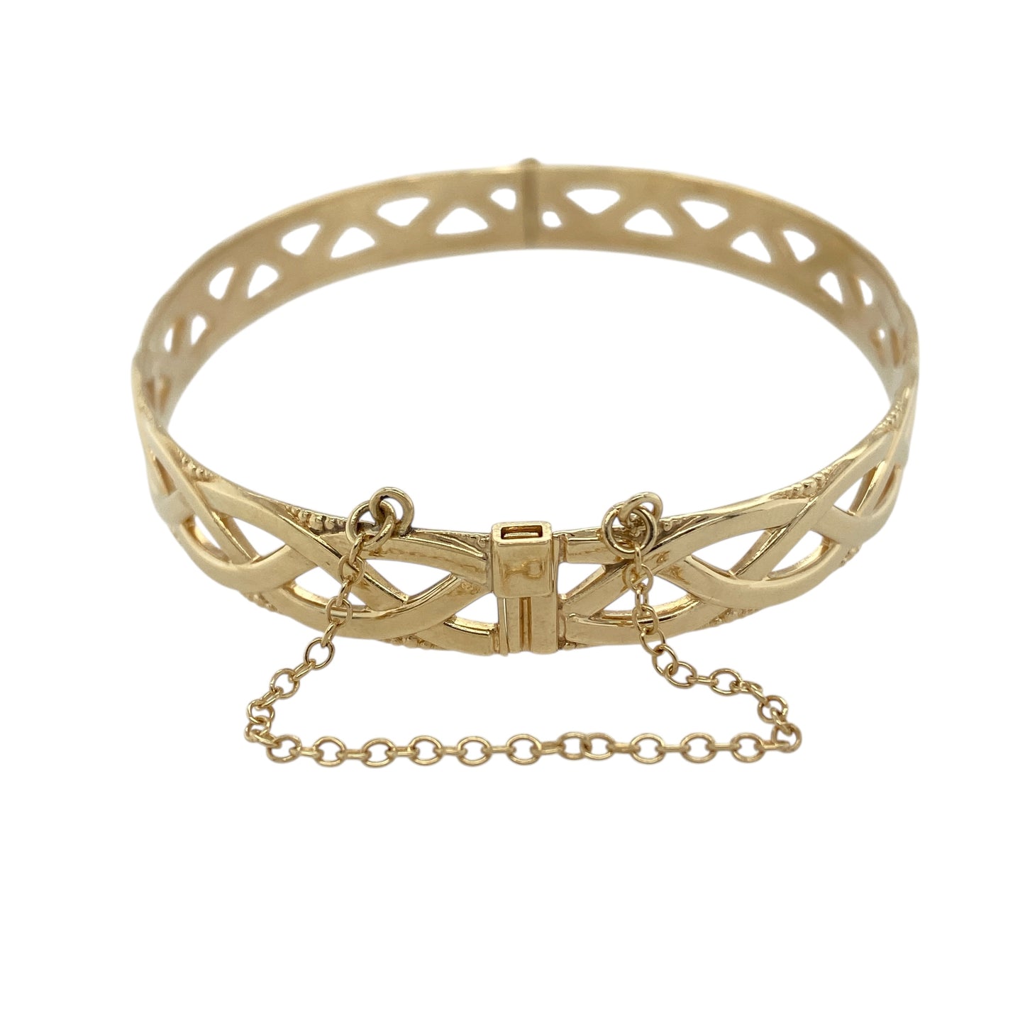 Bring elegant texture and classic craftsmanship to your jewellery collection with this pre-owned 9ct yellow gold open weave bangle, offering a bold yet refined design.

Design: The bangle features an open weave pattern, creating depth and visual interest while allowing light to pass through the design for a striking effect.
Material: Made from 9-carat yellow gold, the warm polished finish enhances the woven detailing and gives the piece a rich golden glow.