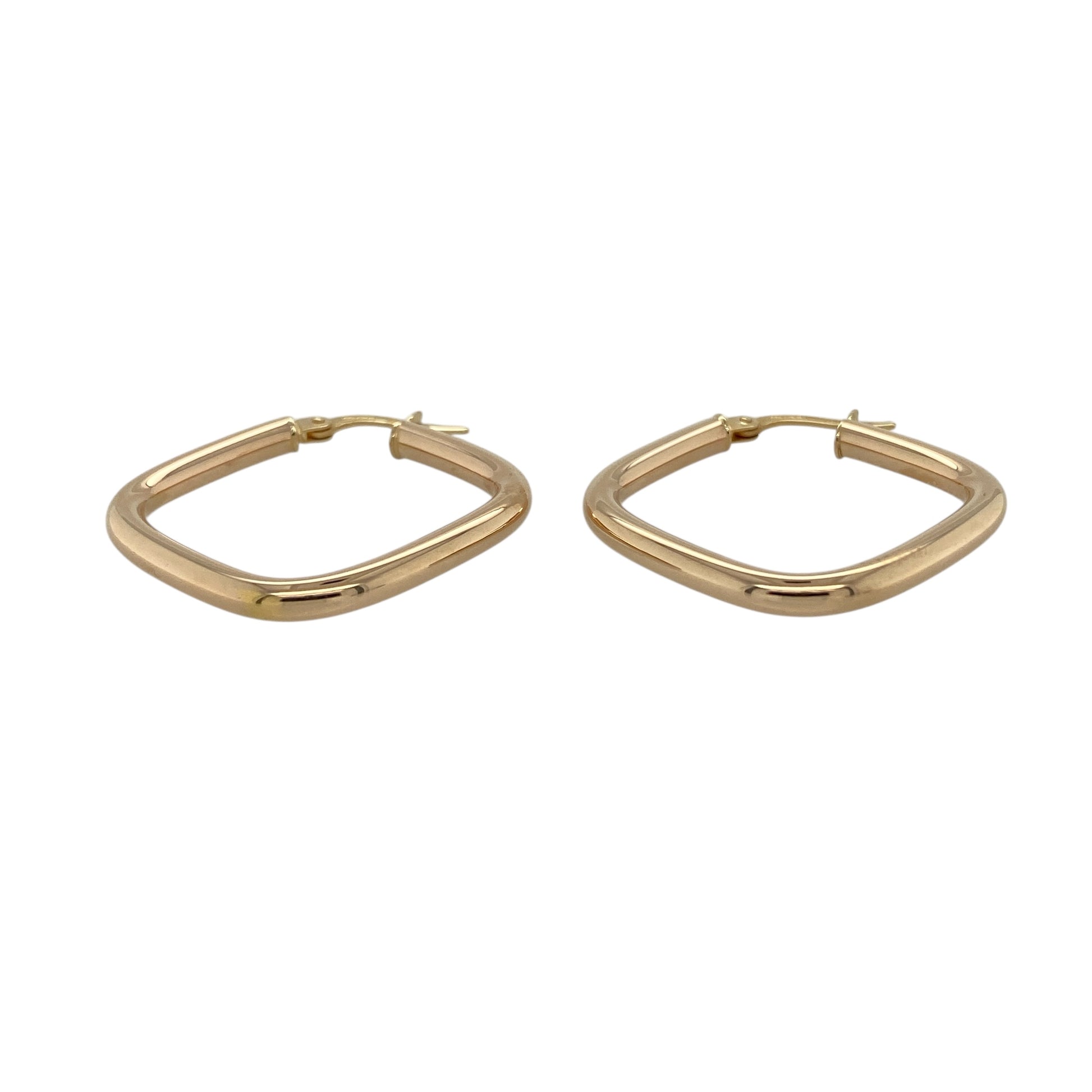 Bring clean lines and timeless elegance to your jewellery collection with these pre-owned 9ct yellow gold square creole earrings, offering a modern take on a classic style.

Design: The earrings feature a square creole hoop design with a smooth, polished finish, creating a sleek and contemporary silhouette.
Material: Made from 9-carat yellow gold, the warm polished tone enhances the structured shape and gives the earrings a classic golden glow.