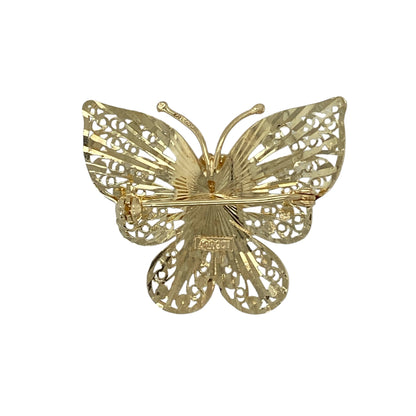 Bring delicate charm and timeless elegance to your jewellery collection with this pre-owned 9ct yellow gold butterfly brooch, offering graceful design with classic appeal.

Design: The brooch features a beautifully shaped butterfly motif, symbolising transformation and beauty, with fine detailing that gives it a light and elegant appearance.
Material: Made from 9-carat yellow gold, the warm polished finish enhances the contours of the butterfly and adds a rich golden glow.