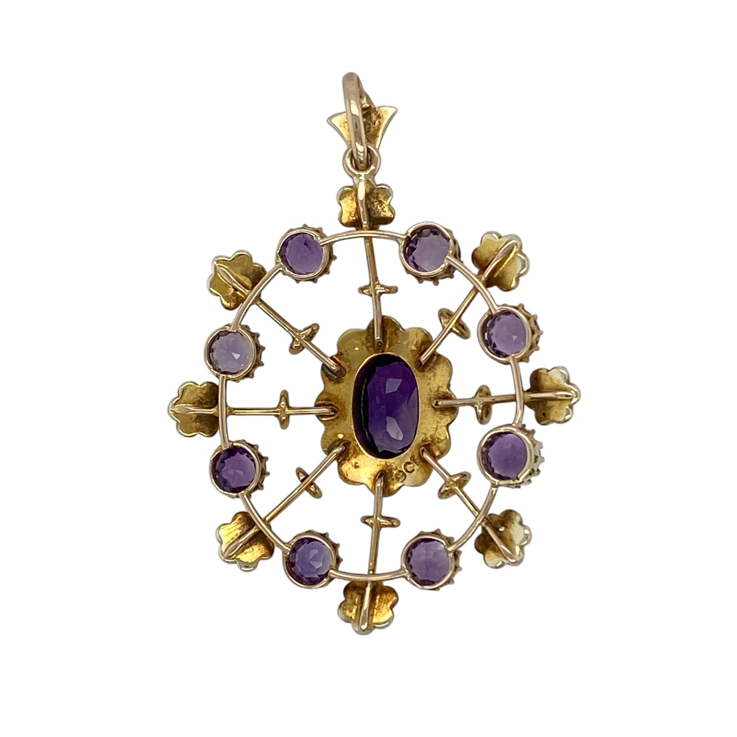 Bring vintage elegance and delicate colour to your jewellery collection with this pre-owned 9ct yellow gold amethyst & seed pearl set pendant, showcasing beautiful period-inspired detailing.

Design: The pendant features a vintage-style floral arrangement, with an oval amethyst at the centre, surrounded by seed pearls and an outer layer of round amethyst stones and seed pearls arranged in flower motifs.