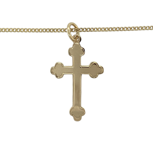 Bring timeless symbolism and classic style to your jewellery collection with this pre-owned 9ct yellow gold cross pendant necklace, offering meaningful design with everyday elegance.

Design: The necklace features a traditional cross pendant with a clean, polished finish, suspended from a classic curb chain for a balanced and refined look.
Material: Made from 9-carat yellow gold, the warm polished tone gives the piece a timeless and enduring appeal.