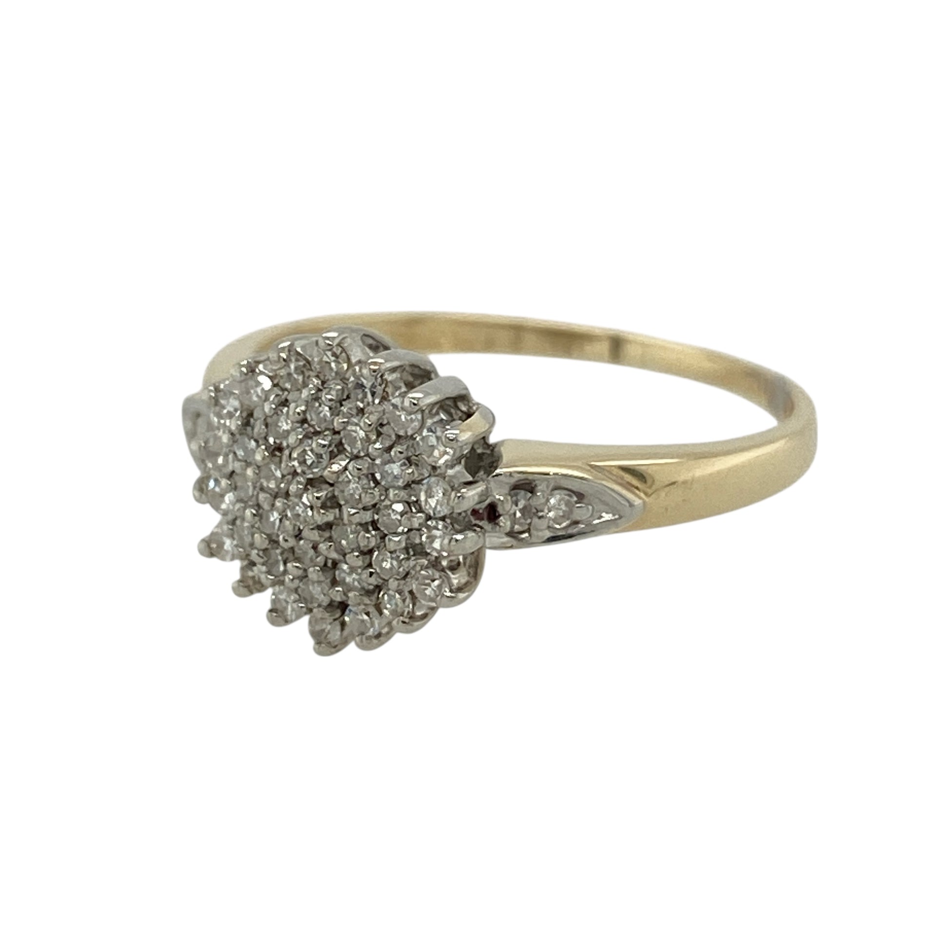 Bring classic sparkle and timeless elegance to your jewellery collection with this pre-owned 9ct yellow gold & diamond set cluster ring, offering refined brilliance in a beautifully balanced design.

Design: The ring features a traditional cluster arrangement, with diamonds grouped together to create a bright and eye-catching focal point at the front.
Material: Made from 9-carat yellow gold, the warm polished finish beautifully complements the sparkle of the diamonds.