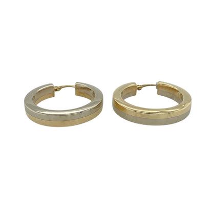 Bring classic elegance and versatile two-tone style to your jewellery collection with these pre-owned 9ct yellow and white gold plain hoop creole earrings, a timeless design with enduring appeal.

Design: The earrings feature a traditional creole hoop style with a smooth, plain finish, combining yellow and white gold for subtle contrast and classic sophistication.
Material: Made from 9-carat yellow and white gold, the polished surfaces enhance the clean lines of the hoops and highlight the two-tone effect.