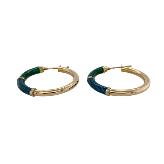 Bring a pop of colour and contemporary charm to your jewellery collection with these pre-owned 9ct rose gold blue and green enamel hoop creole earrings, a stylish design that blends warm gold tones with vibrant enamel detail.

Design: The earrings feature a classic creole hoop shape enhanced with blue and green enamel accents, creating eye-catching contrast and a modern decorative finish.