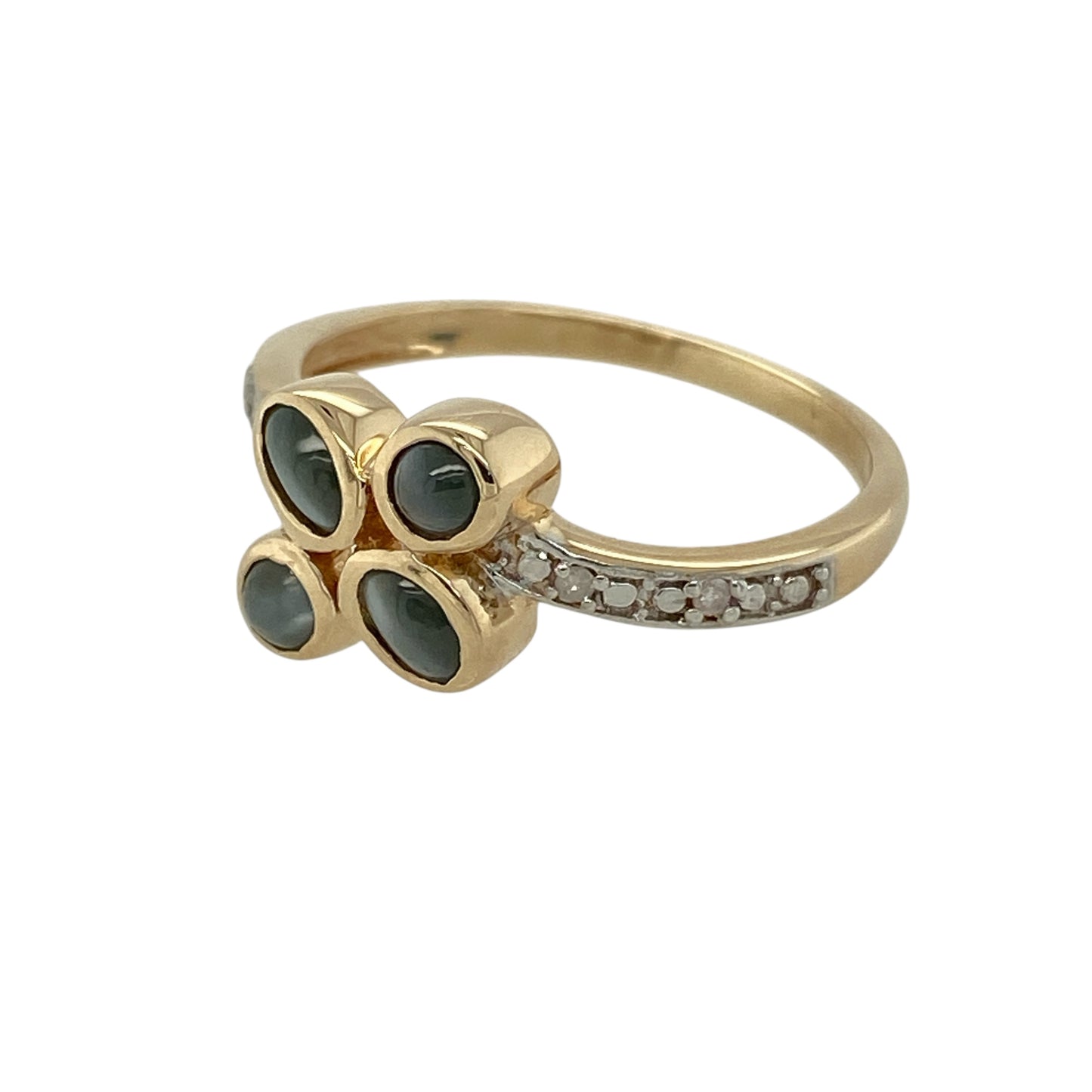 Bring soft iridescence and graceful detail to your jewellery collection with this pre-owned 9ct yellow gold diamond and cat’s eye set flower and vine style ring, a delicate design inspired by natural forms and timeless elegance.

Design: The ring features a flowing flower and vine-inspired design, highlighted by a luminous cat’s eye stone as the focal point, with diamond accents adding gentle sparkle throughout the setting.