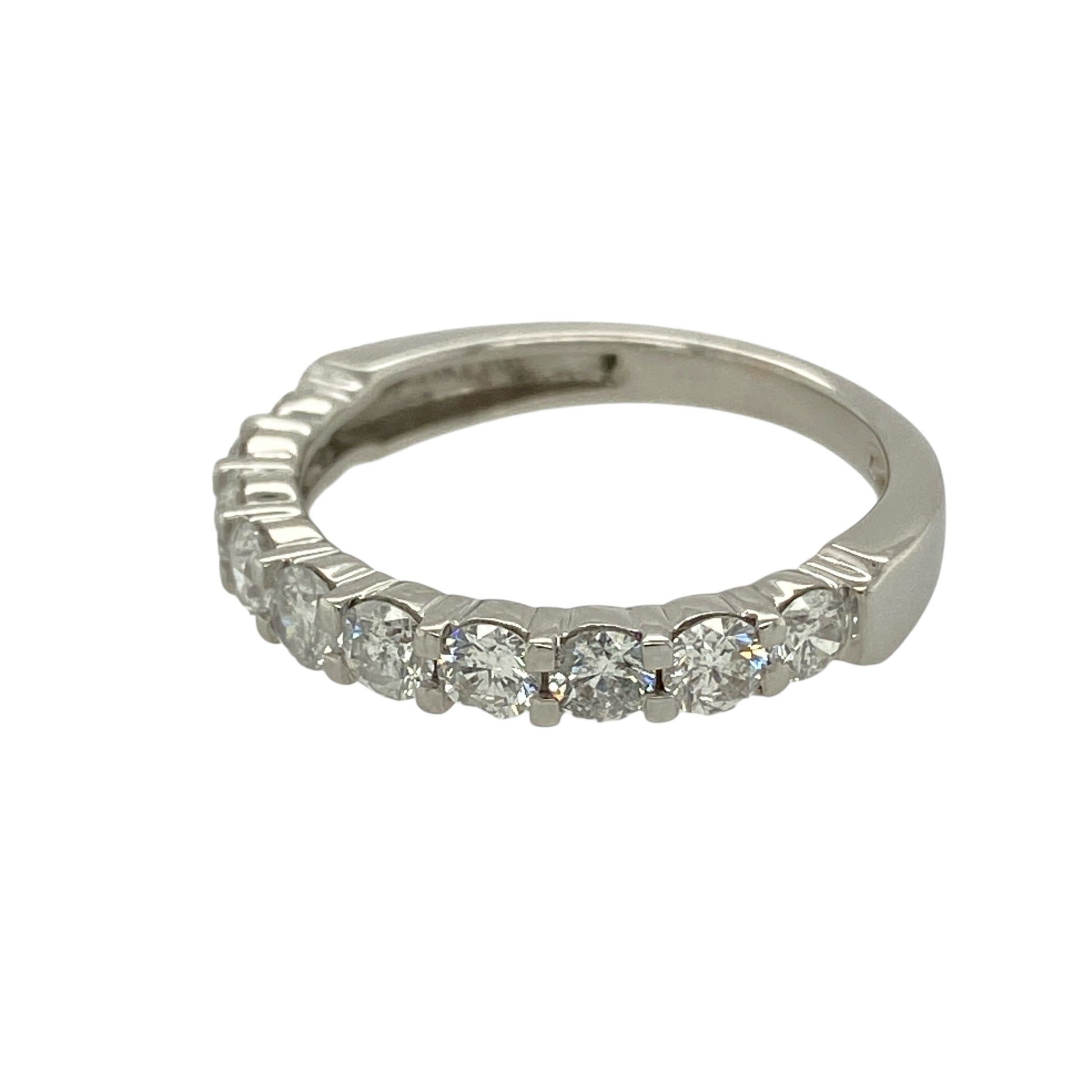 Bring exceptional sparkle and refined luxury to your jewellery collection with this pre-owned 18ct white gold diamond set band ring, a timeless design showcasing impressive diamond brilliance and classic elegance.

Design: The ring features a sleek band front set with ten brilliant-cut diamonds, evenly spaced to create a continuous line of sparkle across the finger.