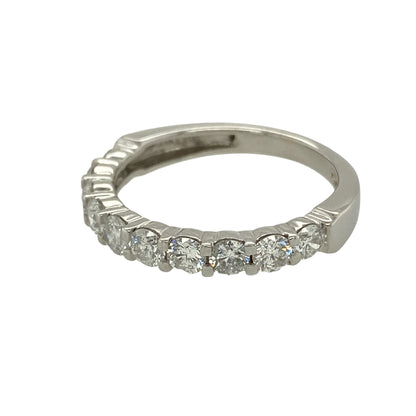 Bring exceptional sparkle and refined luxury to your jewellery collection with this pre-owned 18ct white gold diamond set band ring, a timeless design showcasing impressive diamond brilliance and classic elegance.

Design: The ring features a sleek band front set with ten brilliant-cut diamonds, evenly spaced to create a continuous line of sparkle across the finger.