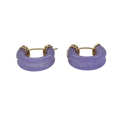 Bring rich colour and classic gold style to your jewellery collection with these pre-owned 9ct yellow gold and purple jade hoop creole earrings, a distinctive design that combines warm gold tones with elegant gemstone detail.

Design: The earrings feature a traditional creole hoop shape accented with smooth purple jade, adding a vibrant pop of colour and a refined decorative finish to the classic silhouette.