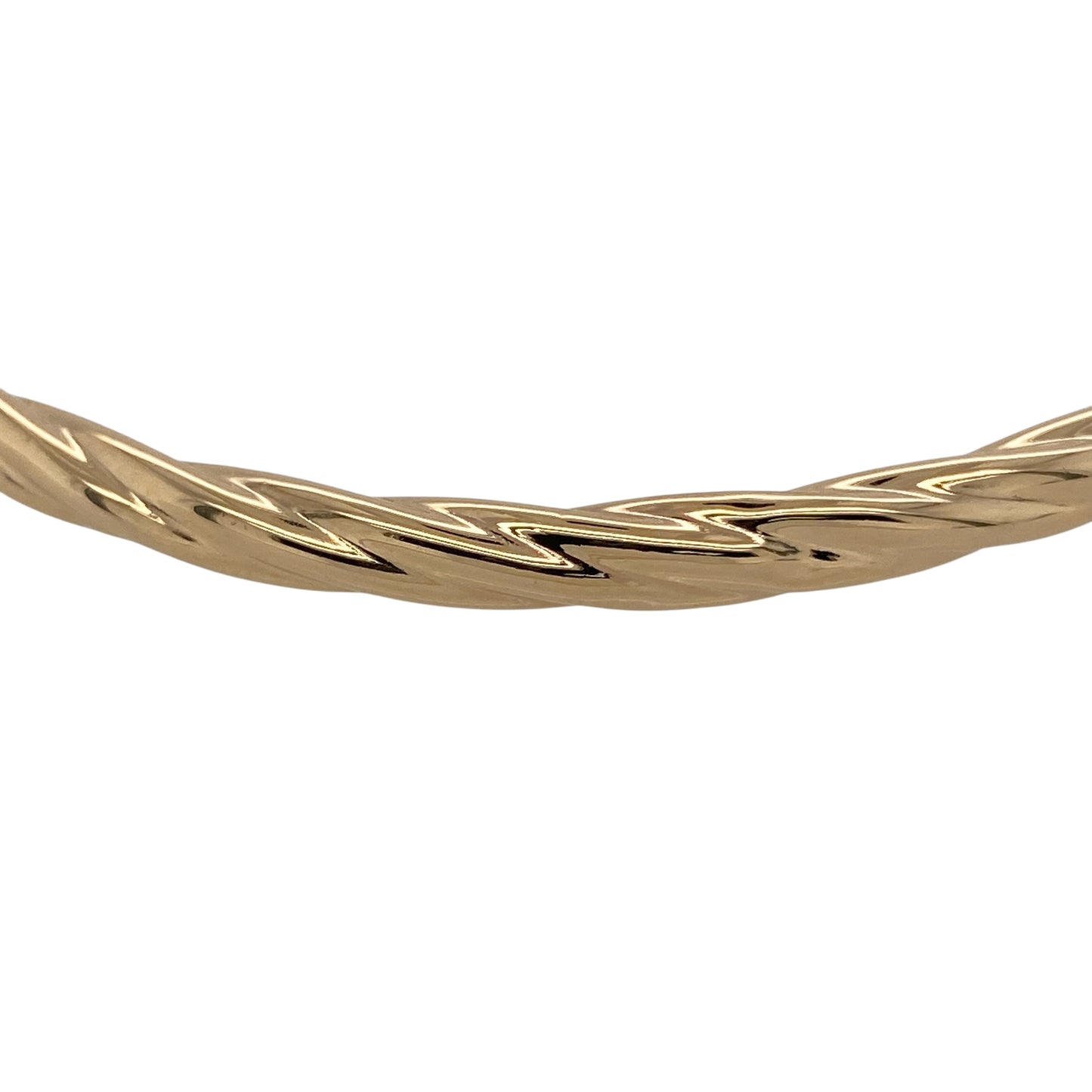 Bring graceful texture and classic gold style to your jewellery collection with this pre-owned 9ct yellow hollow gold twisted bangle, a lightweight and elegant piece perfect for everyday wear.

Design: The bangle features a twisted design that adds flowing texture and visual interest to its sleek profile. Measuring approximately 4mm in width, it offers a refined and delicate presence on the wrist.