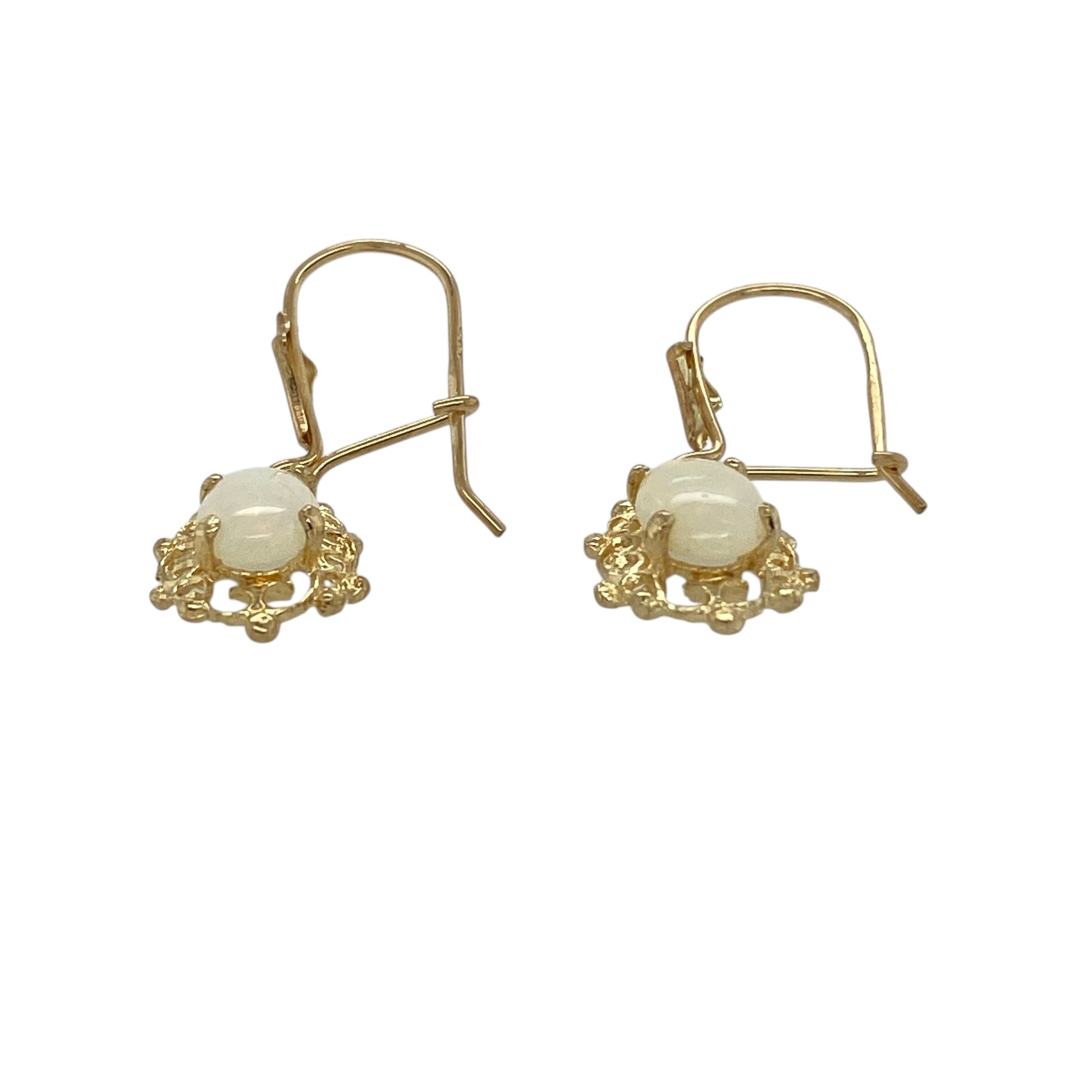 Bring soft iridescence and elegant movement to your jewellery collection with these pre-owned 9ct yellow gold opalique set drop earrings, a refined design with timeless charm.

Design: The earrings feature oval opalique stones suspended in a classic drop style, creating gentle movement and a graceful silhouette. Each stone measures approximately 7mm by 5mm, offering a delicate yet noticeable presence.