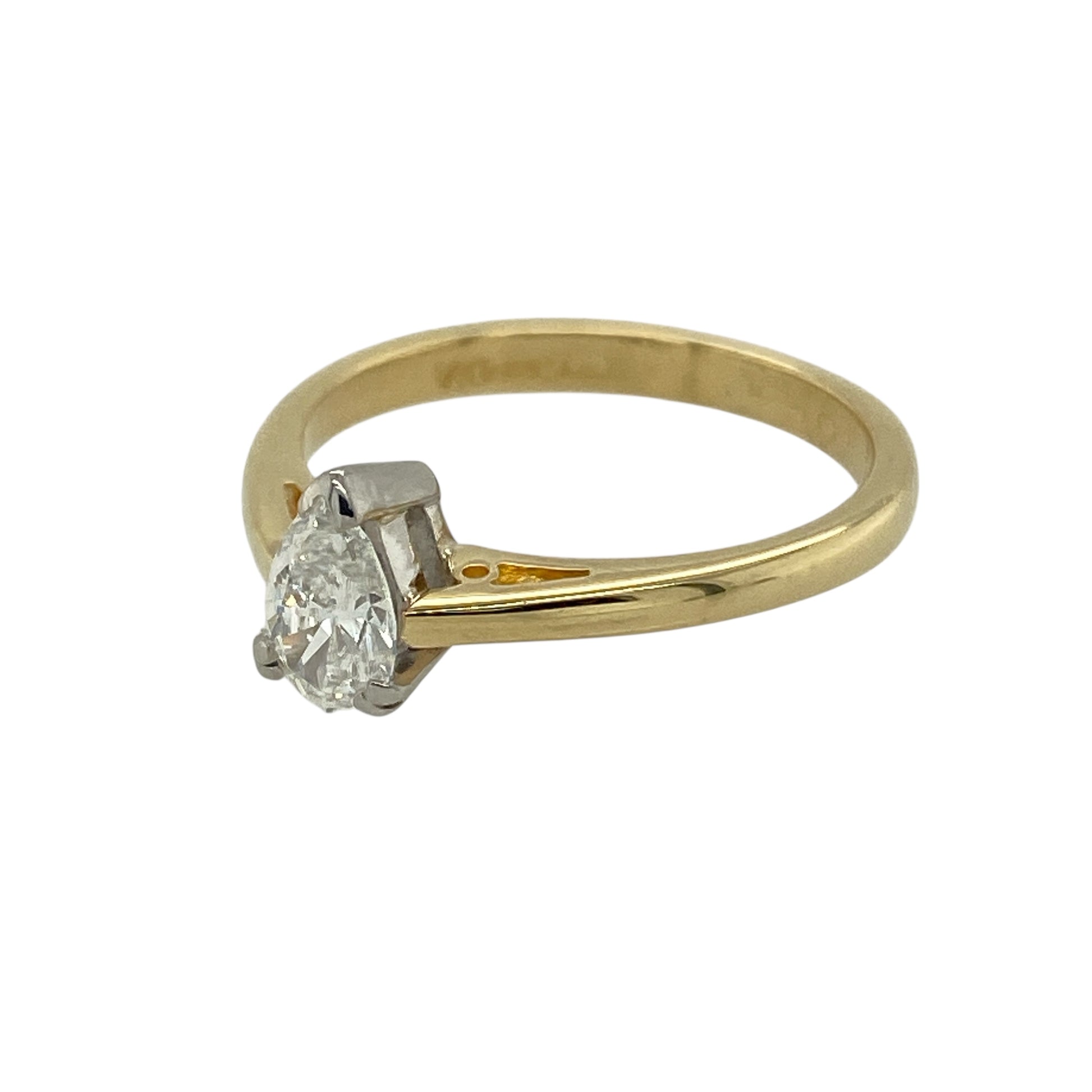 Bring refined elegance and timeless sparkle to your jewellery collection with this pre-owned 18ct yellow gold diamond pear-shaped solitaire ring, a classic design that highlights the beauty of a single, eye-catching diamond.

Design: The ring features a pear-shaped diamond of approximately 0.35ct, creating an elegant and elongated silhouette that draws the eye with its graceful form.