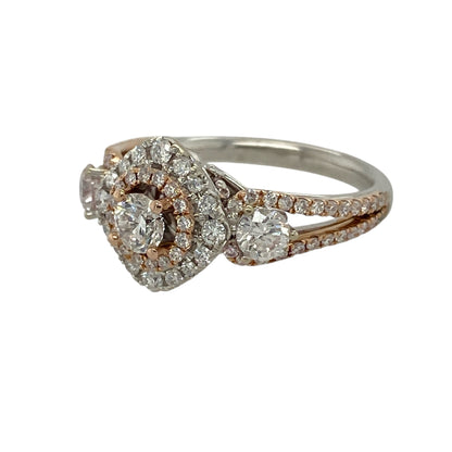 Bring luxurious sparkle and contemporary elegance to your jewellery collection with this pre-owned 14ct white and rose gold diamond double halo ring, a striking design that combines rich diamond brilliance with contrasting precious metals.

Design: The ring showcases an impressive double halo of diamonds, creating depth and radiance, while the split two-band shoulders are also adorned with diamonds for enhanced sparkle and visual interest.