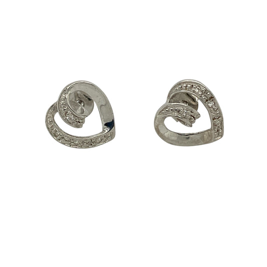 Bring a touch of romantic elegance to your jewellery collection with these pre-owned 9ct white gold diamond open heart stud earrings, a delicate design that combines subtle sparkle with timeless charm.

Design: Each stud features an open heart silhouette, accented with diamonds that add a gentle shimmer while maintaining a light and refined appearance.
Material: Made from polished 9-carat white gold, the cool-toned finish beautifully complements the brilliance of the diamonds.