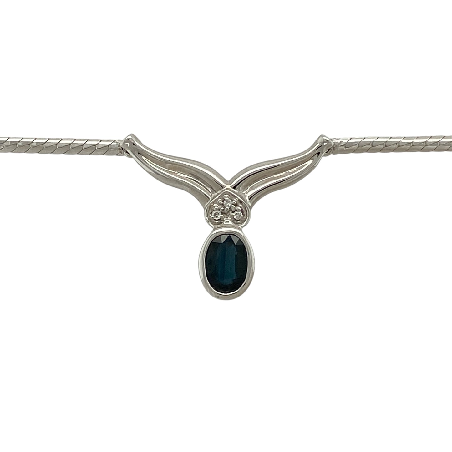 Bring classic elegance and refined colour to your jewellery collection with this pre-owned 9ct white gold diamond & sapphire set necklace, a timeless design that pairs rich blue tones with subtle sparkle.

Design: The necklace features a 7mm by 5mm oval sapphire as the focal point, accented with diamonds that enhance its depth of colour and add gentle brilliance.