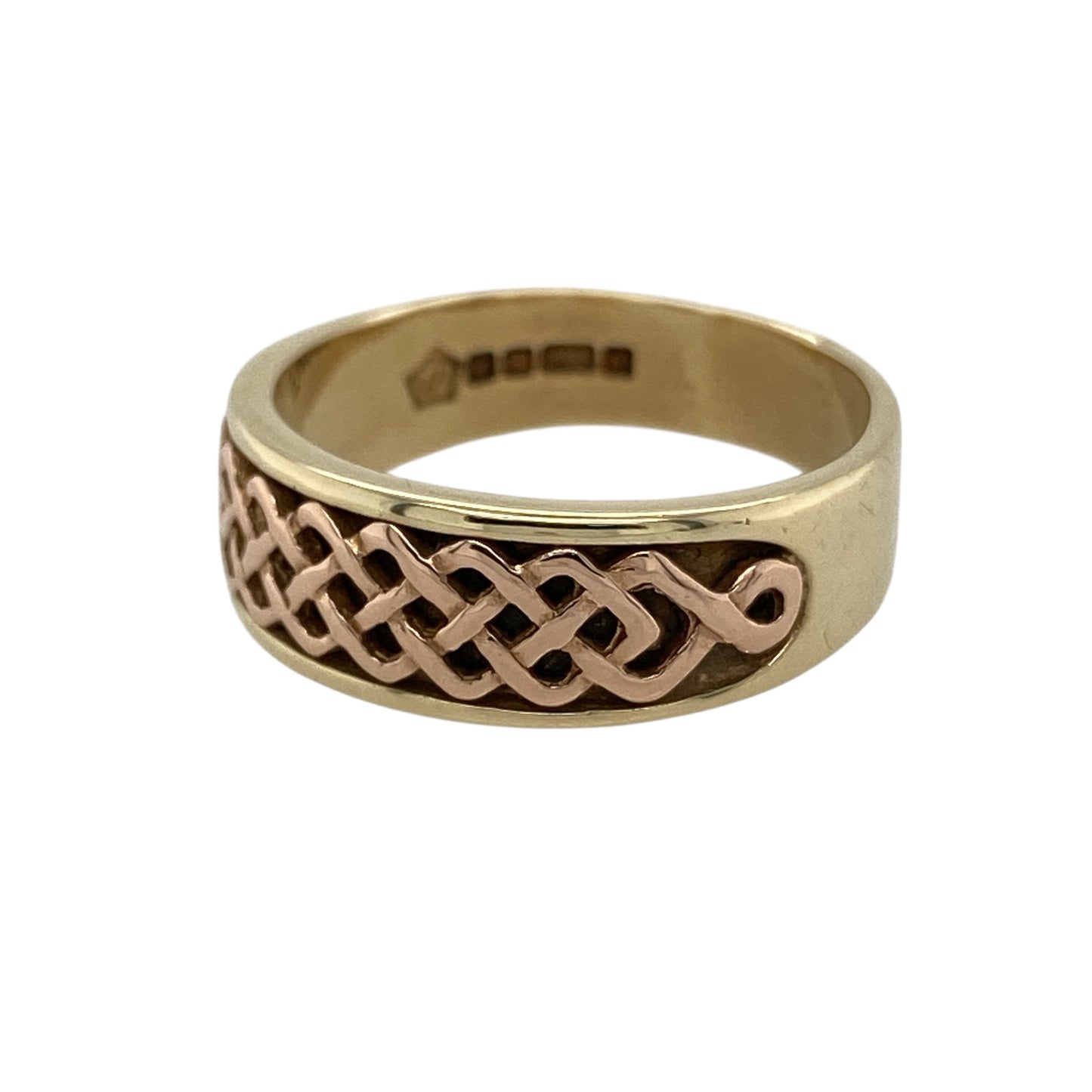 Bring timeless Celtic elegance and meaningful design to your jewellery collection with this pre-owned 9ct yellow and rose gold Clogau Lady Guinevere Celtic band ring, a beautifully symbolic piece inspired by heritage and romance from Clogau.

Design: The front of the band measures 7mm wide and showcases the Lady Guinevere Celtic-inspired motif, offering a distinctive and elegant pattern with traditional roots.
