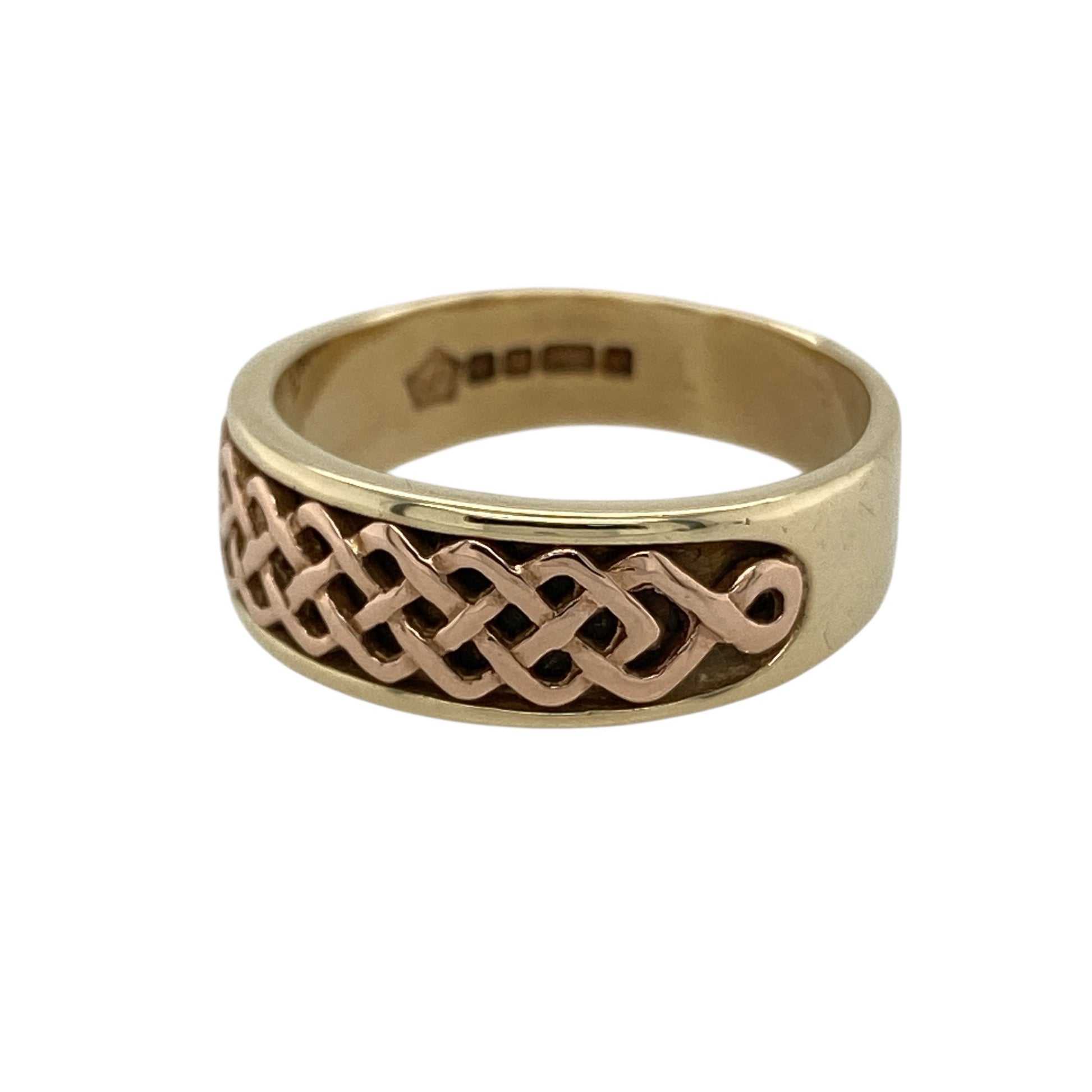 Bring timeless Celtic elegance and meaningful design to your jewellery collection with this pre-owned 9ct yellow and rose gold Clogau Lady Guinevere Celtic band ring, a beautifully symbolic piece inspired by heritage and romance from Clogau.

Design: The front of the band measures 7mm wide and showcases the Lady Guinevere Celtic-inspired motif, offering a distinctive and elegant pattern with traditional roots.