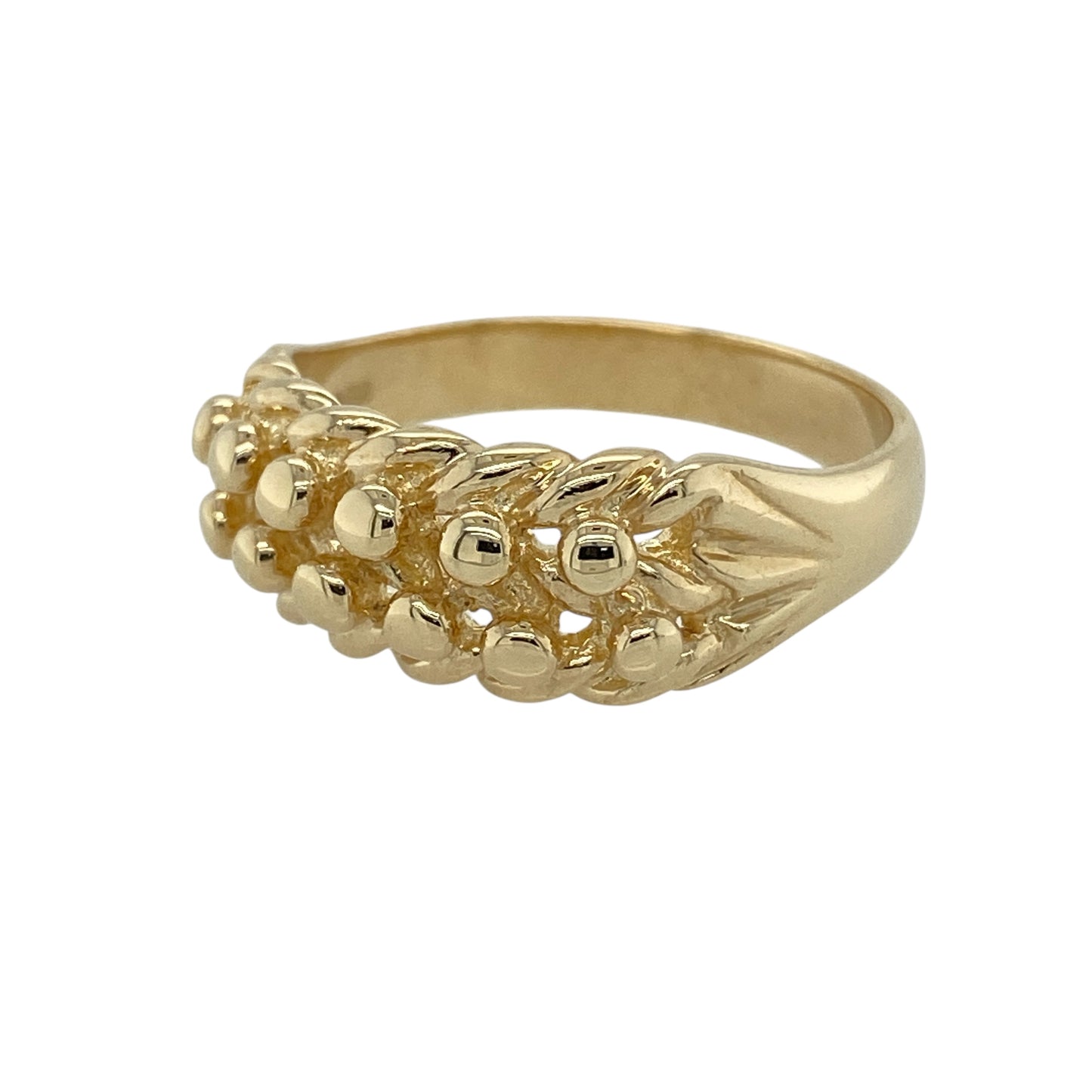 Bring traditional style and enduring character to your jewellery collection with this pre-owned 9ct yellow gold keeper band ring, a classic design known for its bold presence and timeless appeal.

Design: The ring features a traditional keeper-style pattern across the front of the band, measuring 9mm wide, creating a distinctive and textured appearance.
Material: Made from polished 9-carat yellow gold, the warm tone enhances the depth and detail of the keeper design.