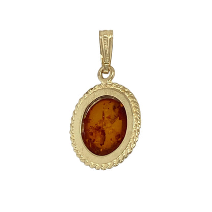 Bring warm, natural tones and classic detailing to your jewellery collection with this pre-owned 9ct yellow gold amber set patterned edge oval pendant, a charming piece with timeless appeal.

Design: The pendant features an oval amber stone measuring 12mm by 10mm, framed by a patterned edge that adds texture and visual interest to the design.
Material: Made from polished 9-carat yellow gold, the warm golden tone beautifully complements the rich, honeyed colour of the amber.
