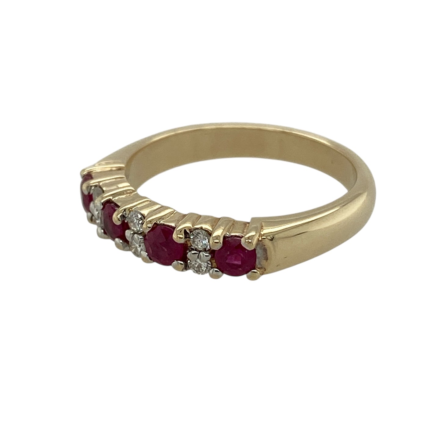 Bring classic colour and subtle sparkle to your jewellery collection with this pre-owned 9ct yellow gold diamond & ruby set band ring, a refined design with timeless appeal.

Design: The band is set with round rubies measuring approximately 3mm in diameter, complemented by diamonds that add gentle brilliance and enhance the rich red tones of the stones.
Material: Made from polished 9-carat yellow gold, the warm golden finish beautifully highlights the rubies and the sparkle of the diamonds.