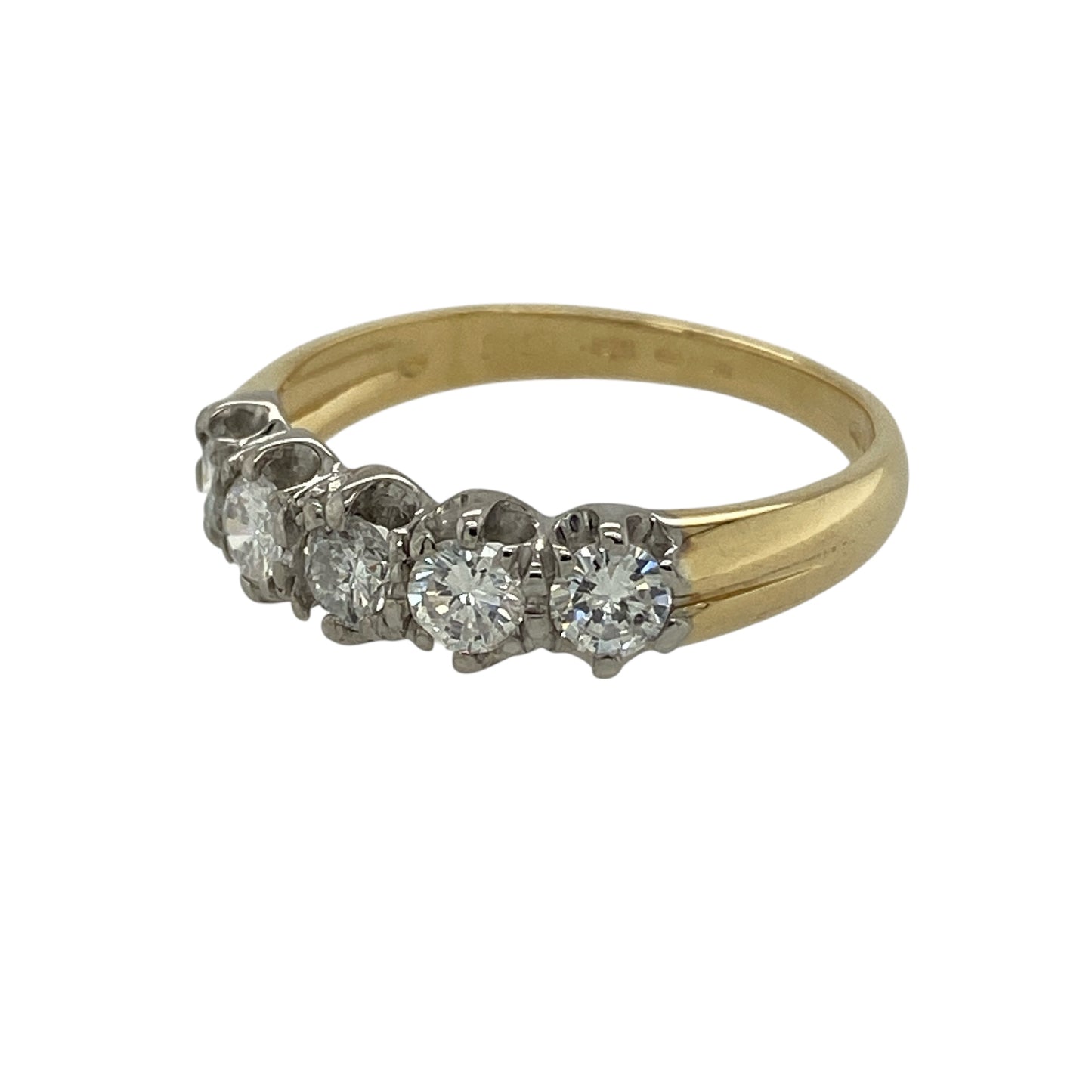 Bring classic sparkle and timeless elegance to your jewellery collection with this pre-owned 18ct yellow gold diamond five stone band ring, a refined design that showcases enduring brilliance.

Design: The front of the band measures 5mm wide and is set with five diamonds arranged in a clean, balanced row, creating a striking yet elegant focal point.
Material: Made from polished 18-carat yellow gold, the warm tone beautifully complements the brilliance of the diamonds.