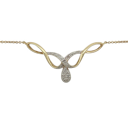 Bring graceful movement and subtle sparkle to your jewellery collection with this pre-owned 9ct yellow and white gold diamond set swirl necklace, a refined design with timeless elegance.

Design: The necklace features a flowing swirl motif accented with diamonds, creating a soft and elegant focal point with gentle sparkle.
Material: Made from a combination of 9-carat yellow and white gold, the contrasting tones add depth and highlight the fluid design.