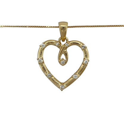 Bring timeless romance and elegant sparkle to your jewellery collection with this pre-owned 18ct yellow gold diamond set open heart pendant necklace, a graceful design with classic appeal.

Design: The pendant features an open heart motif accented with diamonds, creating a delicate yet eye-catching focal point. Measuring 2.4cm long including the bail, it offers a refined and romantic silhouette.