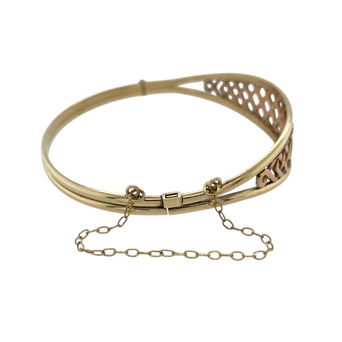 Bring timeless Celtic elegance and symbolic design to your jewellery collection with this pre-owned 9ct yellow and rose gold Clogau Lady Guinevere bangle, a beautifully crafted piece inspired by heritage and romance from Clogau.

Design: The bangle features the Lady Guinevere motif across the front, which measures 14mm high, creating a bold yet elegant focal point rooted in Celtic tradition.