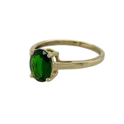Bring rich colour and elegant simplicity to your jewellery collection with this pre-owned 9ct yellow gold chrome diopside set solitaire ring, a timeless design that showcases a vibrant green gemstone.

Design: The ring features an oval chrome diopside measuring 8mm by 6mm, creating a striking focal point within the classic solitaire style.
Material: Made from polished 9-carat yellow gold, the warm tone beautifully complements the deep green hue of the chrome diopside.