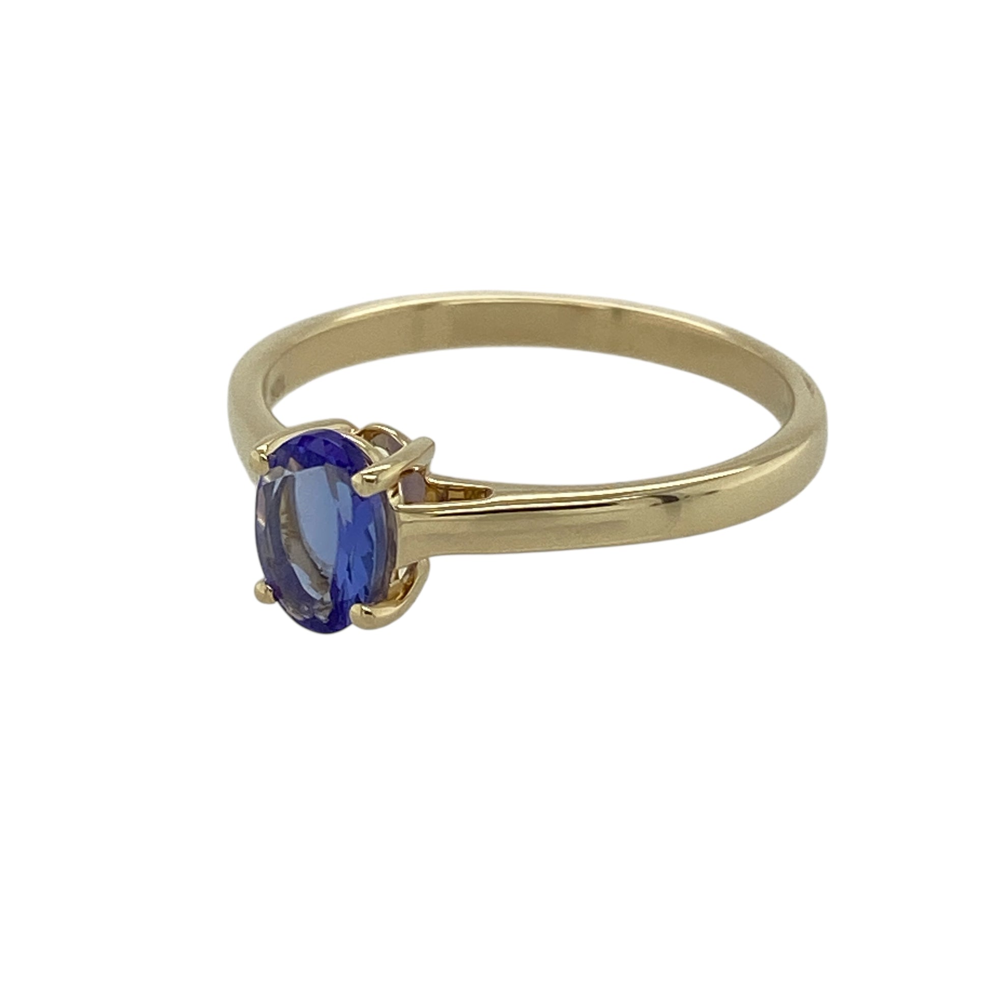 Bring soft colour and elegant simplicity to your jewellery collection with this pre-owned 9ct yellow gold tanzanite set solitaire ring, a refined design that highlights the beauty of a delicate gemstone.

Design: The ring features an oval tanzanite-coloured stone measuring 6mm by 4mm, creating a graceful focal point with a classic solitaire style.
Material: Made from polished 9-carat yellow gold, the warm tone beautifully contrasts with the cool violet-blue hue of the tanzanite.