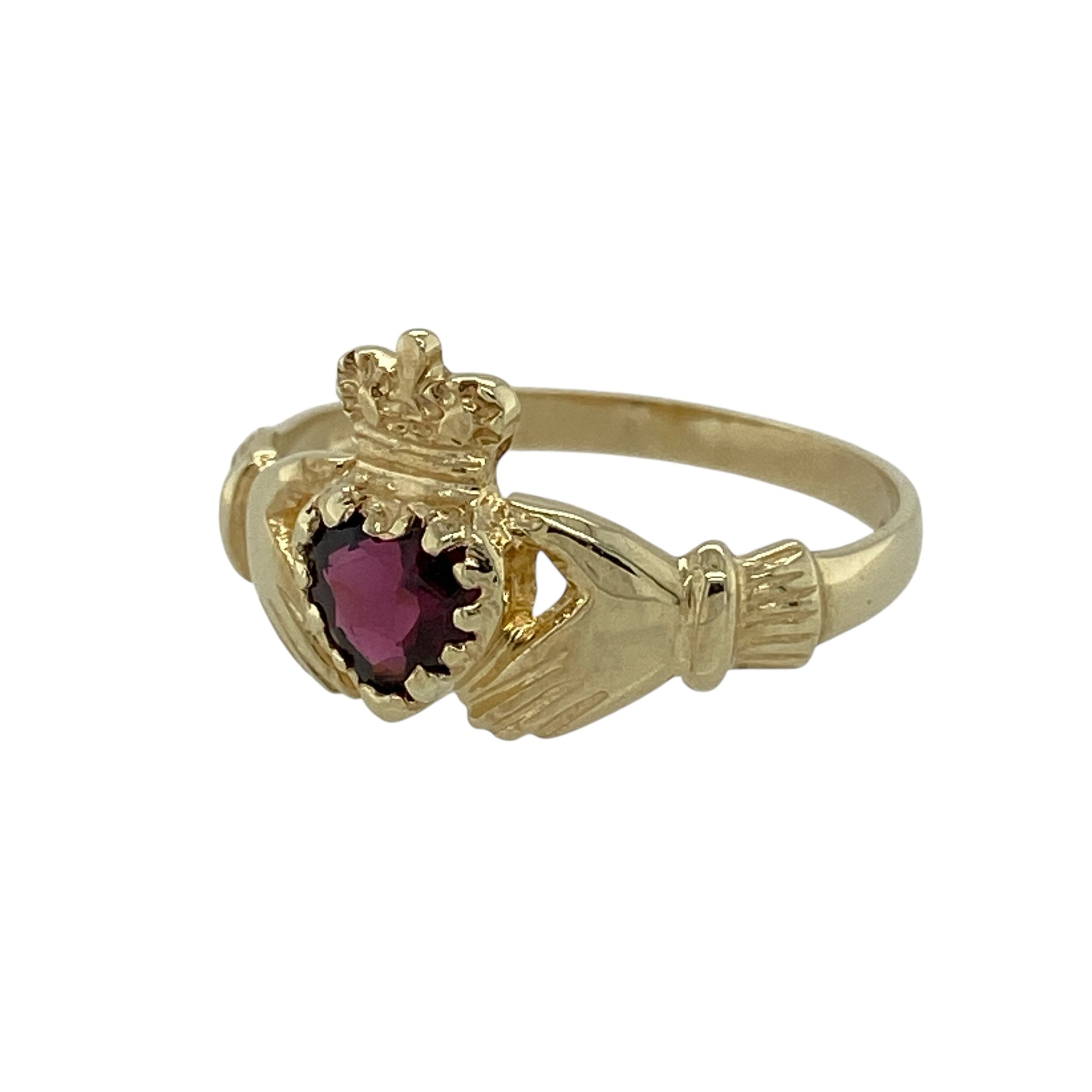 Bring meaningful symbolism and rich colour to your jewellery collection with this pre-owned 9ct yellow gold garnet set Claddagh ring, a timeless design steeped in tradition and sentiment.

Design: The ring features the classic Claddagh motif—hands, heart, and crown—centred with a garnet stone measuring approximately 5mm, adding a deep red focal point to the symbolic design.
