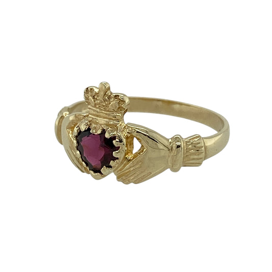 Bring meaningful symbolism and rich colour to your jewellery collection with this pre-owned 9ct yellow gold garnet set Claddagh ring, a timeless design steeped in tradition and sentiment.

Design: The ring features the classic Claddagh motif—hands, heart, and crown—centred with a garnet stone measuring approximately 5mm, adding a deep red focal point to the symbolic design.