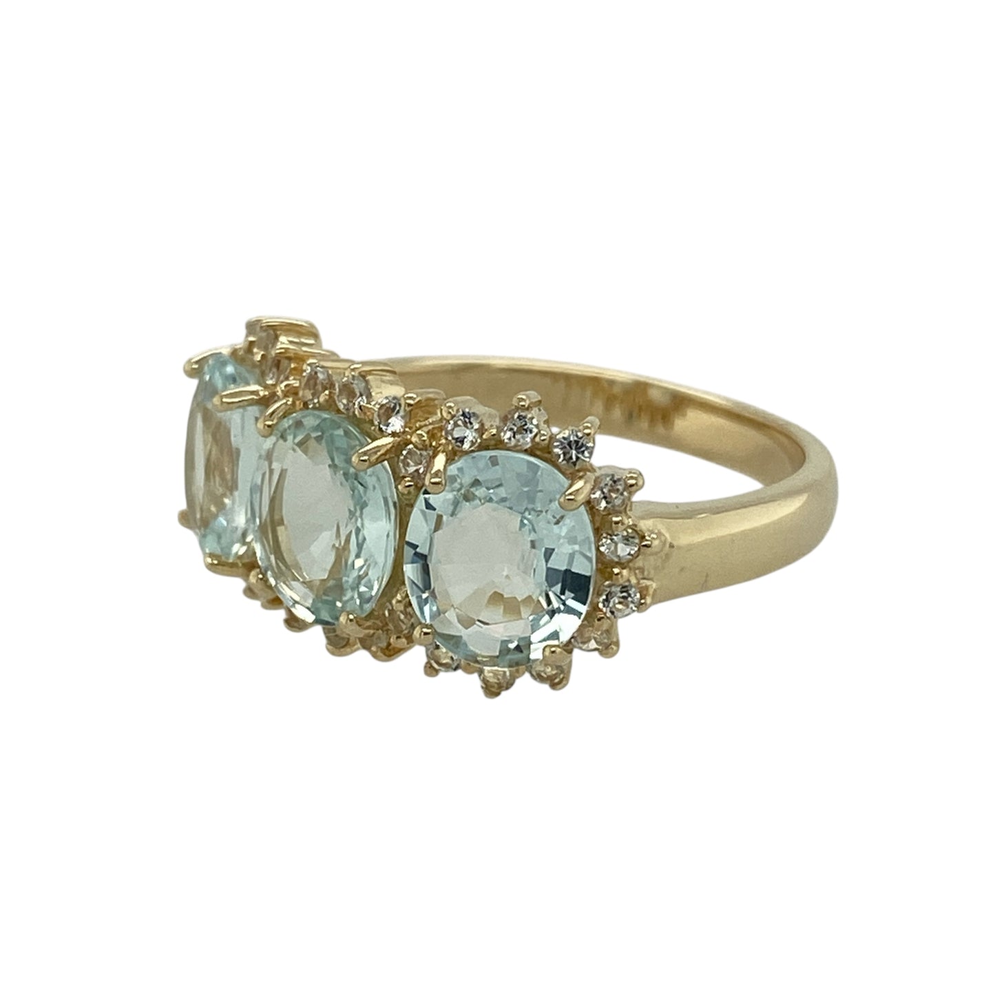 Bring soft colour and refined sparkle to your jewellery collection with this pre-owned 9ct yellow gold aquamarine & white topaz set ring, a graceful design with elegant presence.

Design: The ring features oval aquamarine stones, each measuring 7mm by 6mm, surrounded by white topaz stones that enhance the gentle blue tones and add radiant sparkle.
Material: Made from polished 9-carat yellow gold, the warm tone beautifully complements the cool clarity of the aquamarine and the brilliance of the white topaz.