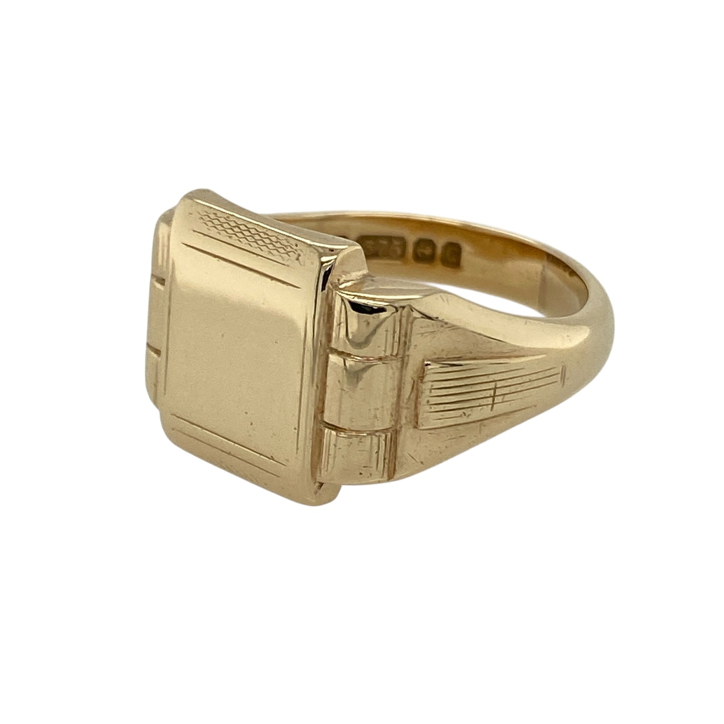Bring bold structure and classic signet style to your jewellery collection with this pre-owned 9ct yellow gold rectangular signet ring, a distinctive design with strong character.

Design: The ring features a rectangular signet face measuring 13mm high, complemented by watch strap–style detailing along the shoulders that adds texture and visual interest.
Material: Made from polished 9-carat yellow gold, the warm tone enhances the clean lines and robust profile of the ring.
