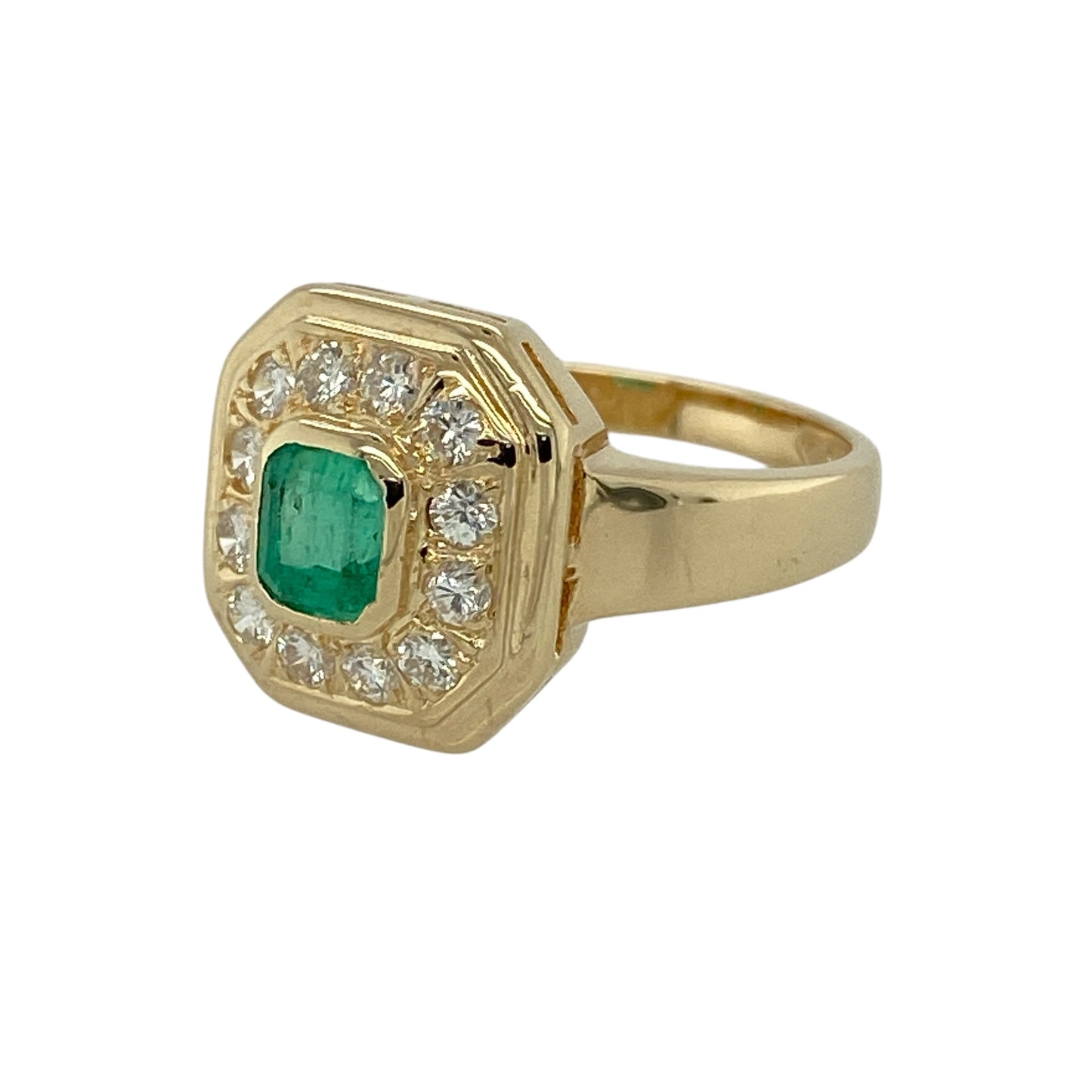 Bring refined colour and classic sparkle to your jewellery collection with this pre-owned 14ct yellow gold diamond & emerald set halo ring, an elegant design with timeless appeal.

Design: The ring features a rectangular halo setting centred with an emerald measuring 5mm by 4mm, surrounded by a frame of diamonds that enhance the rich green colour and add radiant sparkle.