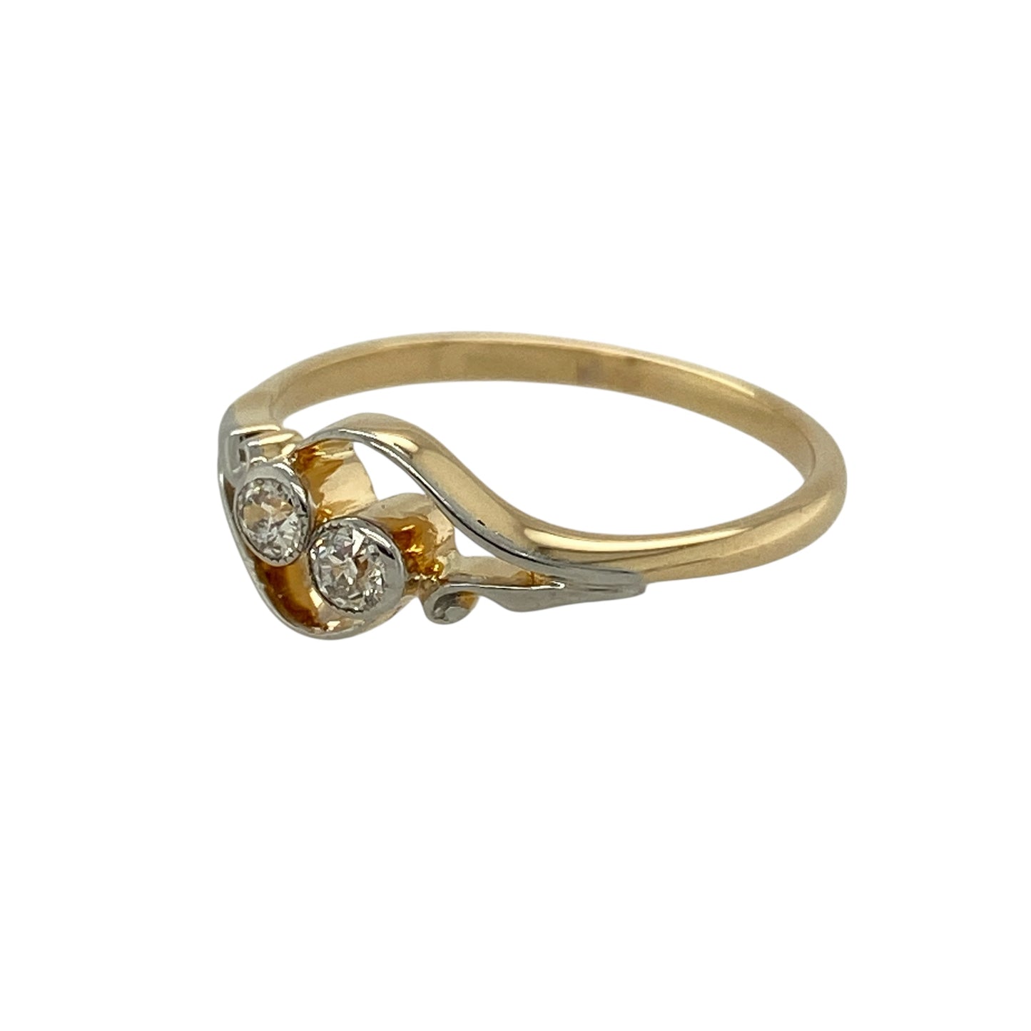 Bring vintage charm and refined sparkle to your jewellery collection with this pre-owned 18ct yellow gold diamond set vintage twist ring, a graceful design with timeless character.

Design: The ring features an elegant twist-style front, creating a flowing and decorative look that reflects classic vintage styling.
Material: Made from polished 18-carat yellow gold, the rich golden tone enhances the warmth and traditional appeal of the design.