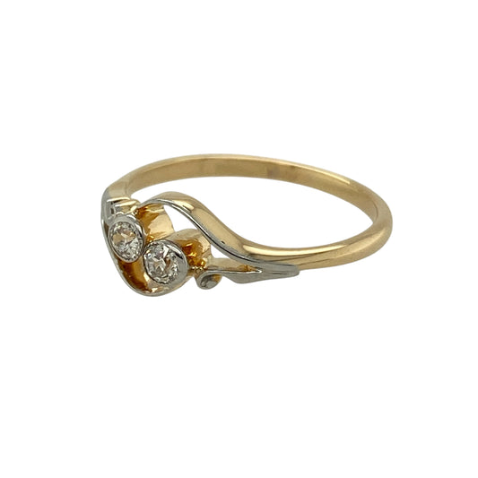 Bring vintage charm and refined sparkle to your jewellery collection with this pre-owned 18ct yellow gold diamond set vintage twist ring, a graceful design with timeless character.

Design: The ring features an elegant twist-style front, creating a flowing and decorative look that reflects classic vintage styling.
Material: Made from polished 18-carat yellow gold, the rich golden tone enhances the warmth and traditional appeal of the design.