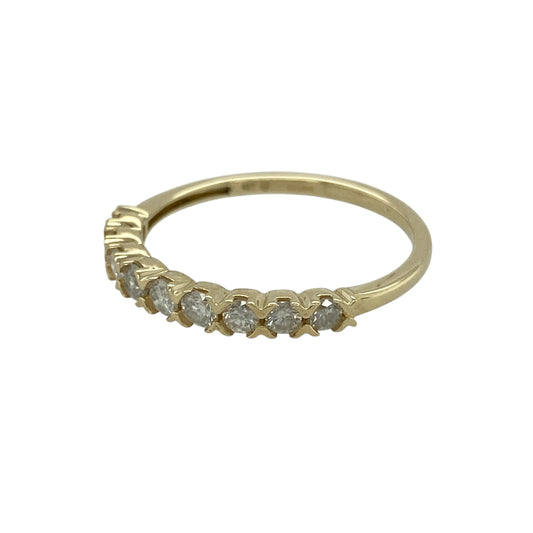Bring understated sparkle and timeless simplicity to your jewellery collection with this pre-owned 9ct yellow gold diamond set band ring, a refined design ideal for everyday wear.

Design: The front of the band measures 2mm wide and is delicately accented with diamonds, creating a subtle and elegant line of sparkle.
Material: Made from polished 9-carat yellow gold, the warm golden tone beautifully complements the brilliance of the diamonds.