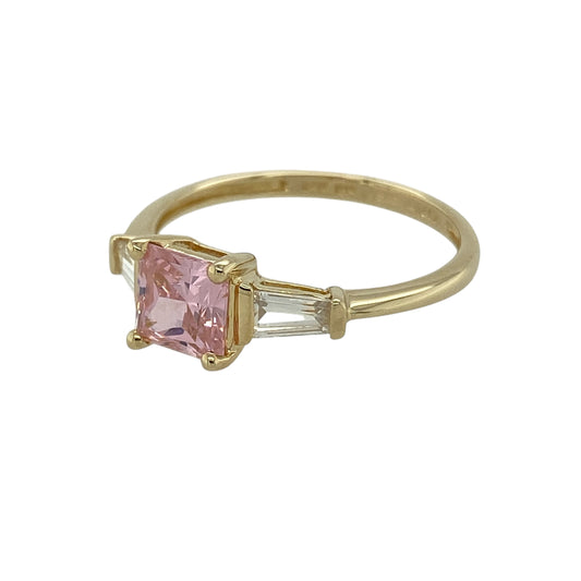 Bring soft colour and refined sparkle to your jewellery collection with this pre-owned 9ct yellow gold pink stone & cubic zirconia set ring, a charming design with elegant balance.

Design: The ring features a square pink centre stone measuring 6mm by 6mm, creating a bold yet feminine focal point, complemented by a cubic zirconia stone set on either side for added brilliance.