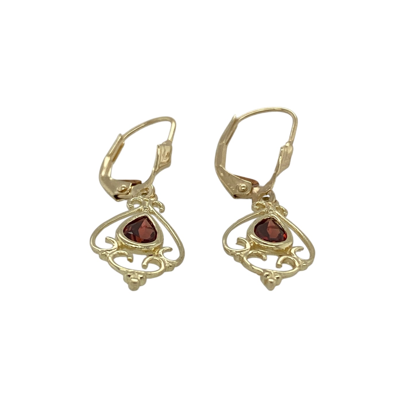 Bring rich colour and graceful movement to your jewellery collection with these pre-owned 9ct yellow gold garnet set drop earrings, a delicate design with timeless elegance.

Design: Each earring features a teardrop-shaped garnet stone measuring approximately 5mm by 3mm, forming a deep red focal point that adds subtle sophistication.
Material: Made from polished 9-carat yellow gold, the warm tone beautifully complements the rich hue of the garnets.