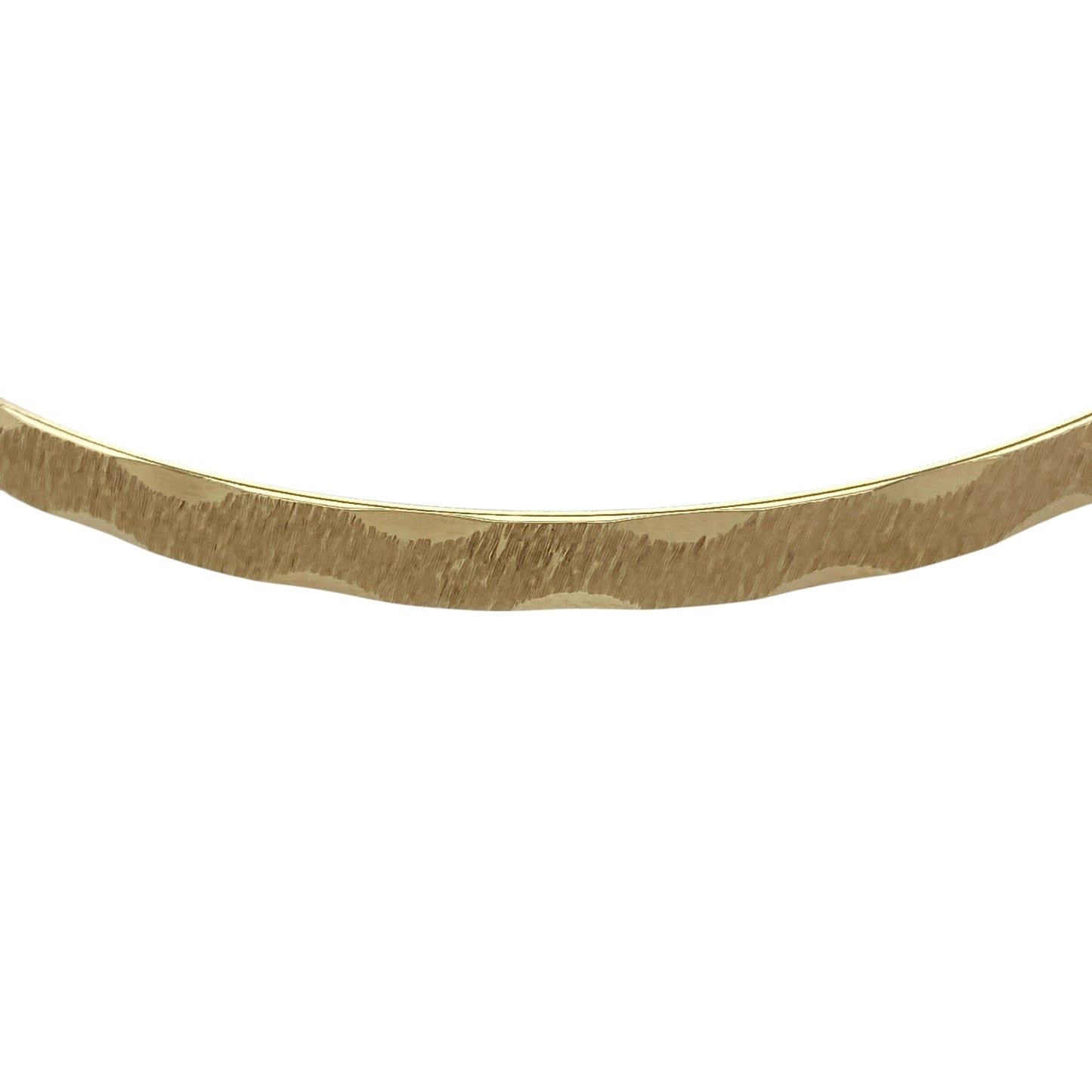 Bring understated sophistication and timeless style to your jewellery collection with this pre-owned 9ct yellow solid gold patterned brushed-effect bangle, a refined piece designed for effortless everyday elegance or polished occasion wear.

Design: This bangle features a classic circular silhouette enhanced by a subtle patterned finish and brushed texture, creating depth and visual interest while maintaining a clean, minimalist look.