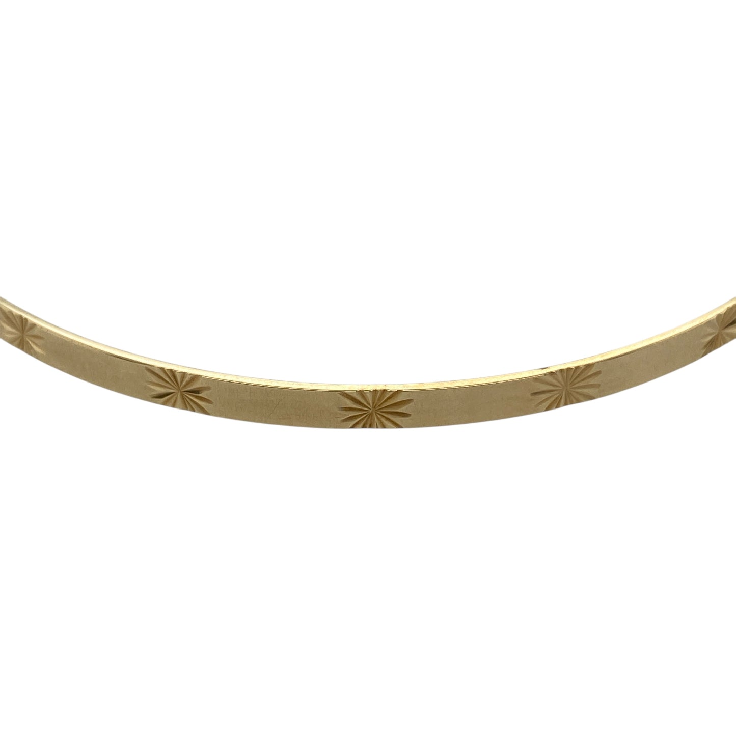 Bring delicate detail and timeless charm to your jewellery collection with this pre-owned 9ct yellow solid gold star patterned bangle, a refined piece that adds subtle character to both everyday and occasion wear.

Design: This bangle features a classic circular profile accented with an elegant star pattern, offering a decorative yet understated finish that catches the light beautifully.