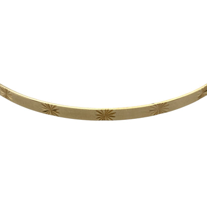Bring delicate detail and timeless charm to your jewellery collection with this pre-owned 9ct yellow solid gold star patterned bangle, a refined piece that adds subtle character to both everyday and occasion wear.

Design: This bangle features a classic circular profile accented with an elegant star pattern, offering a decorative yet understated finish that catches the light beautifully.