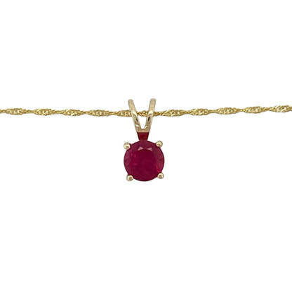Bring rich colour and delicate elegance to your jewellery collection with this pre-owned 9ct yellow gold and ruby pendant necklace, a refined piece ideal for everyday wear or subtle occasion styling.

Design: The necklace features a vibrant round ruby displayed in a classic pendant design, suspended from a fine Singapore chain that adds gentle movement and sparkle.
Material: Made from 9-carat yellow gold, the warm golden tone beautifully complements the deep red hue of the ruby.