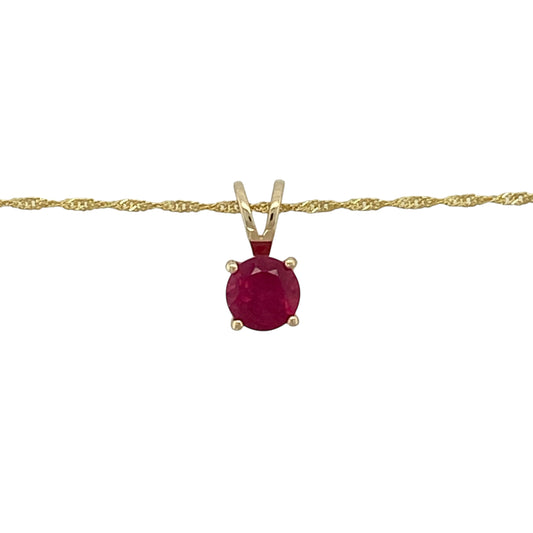 Bring rich colour and delicate elegance to your jewellery collection with this pre-owned 9ct yellow gold and ruby pendant necklace, a refined piece ideal for everyday wear or subtle occasion styling.

Design: The necklace features a vibrant round ruby displayed in a classic pendant design, suspended from a fine Singapore chain that adds gentle movement and sparkle.
Material: Made from 9-carat yellow gold, the warm golden tone beautifully complements the deep red hue of the ruby.