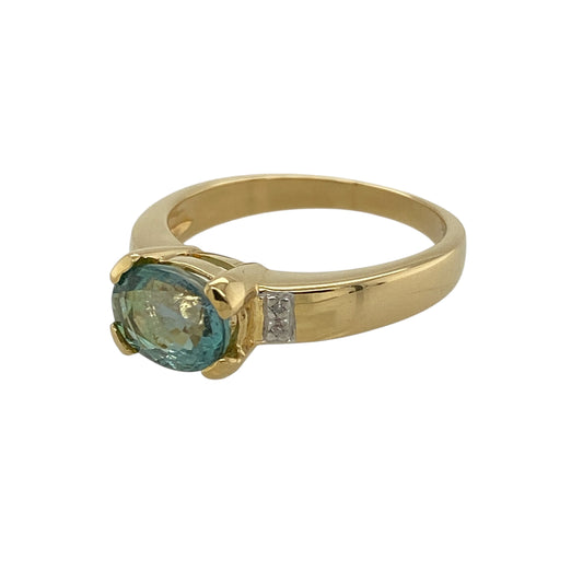 Bring refined colour and timeless elegance to your jewellery collection with this pre-owned 18ct yellow gold diamond and blue topaz set ring, a classic design with graceful sparkle.

Design: The ring features a striking oval blue topaz at the centre, complemented by diamonds set to either side, creating a beautifully balanced and elegant three-stone style.